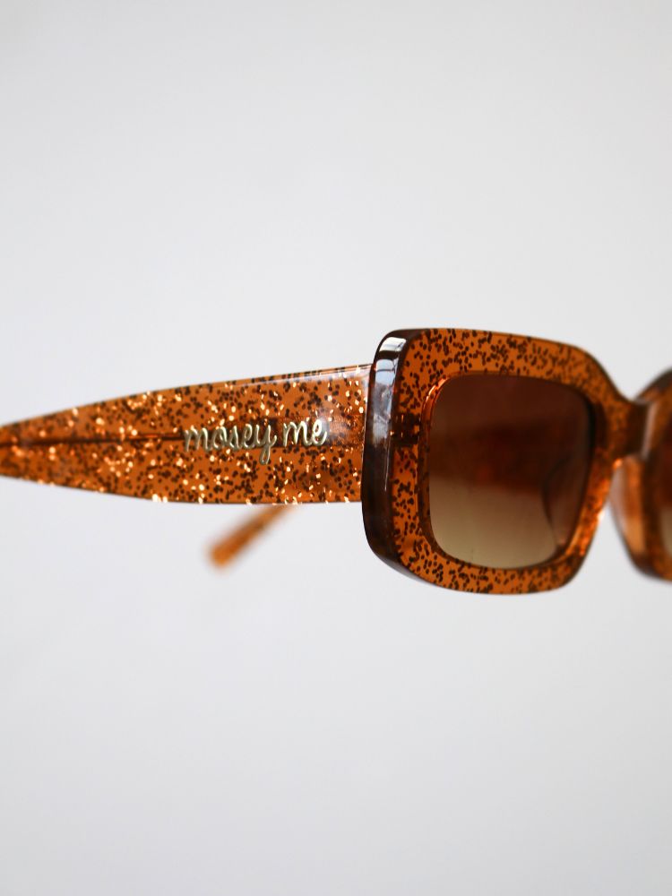 MAUDE X Mosey Me Bella Sunglasses in Bronze Glitter